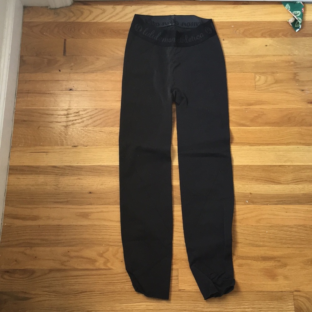 Dark grey Lululemon leggings. Knit material.